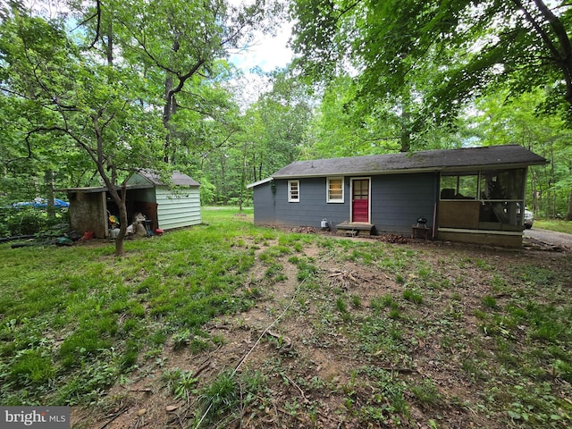 305 Raccoon Dr, Winchester, VA 22602 - rear view of property featuring a sunroom