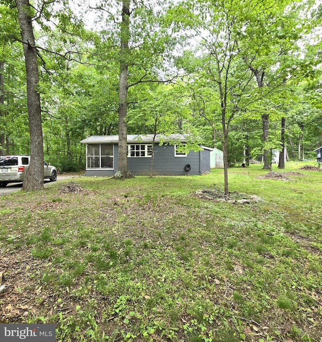 305 Raccoon Dr, Winchester, VA 22602 - view of yard featuring a sunroom