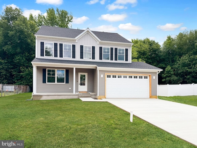 31 N Miller Ave, Carneys Point, NJ 08069 - view of front facade featuring driveway, a garage, covered porch, and board and batten siding