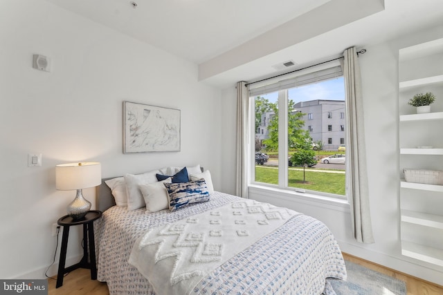 1007 Bryant St NE Unit 3, Washington, DC 20018 - bedroom with wood finished floors and baseboards