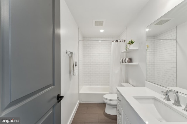 1007 Bryant St NE Unit 3, Washington, DC 20018 - bathroom featuring tile patterned flooring, vanity, toilet, and shower / tub combo with curtain