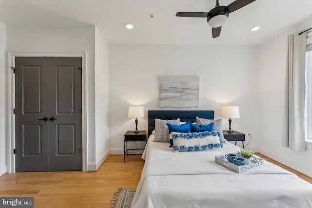 1007 Bryant St NE Unit 3, Washington, DC 20018 - bedroom with light wood-type flooring, baseboards, recessed lighting, and ceiling fan