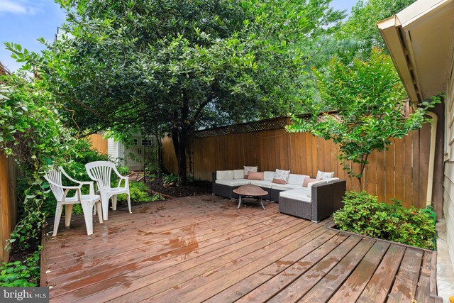 1205 G St NE, Washington, DC 20002 - deck featuring outdoor lounge area and a fenced backyard