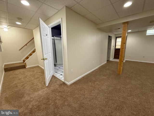 8 Steve Way, Baltimore, MD 21236 - below grade area with carpet floors, stairs, baseboards, a paneled ceiling, and recessed lighting