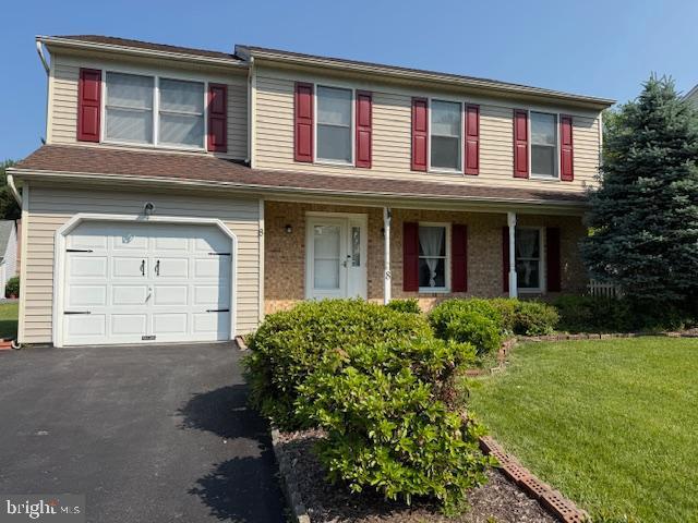 8 Steve Way, Baltimore, MD 21236 - view of front of house with a garage, a front lawn, asphalt driveway, and covered porch