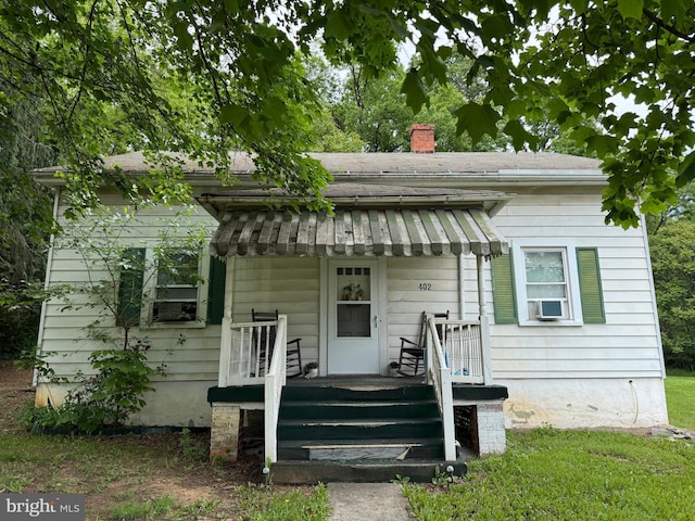 386 Round Hill Rd, Winchester, VA 22602 - bungalow-style house with a chimney