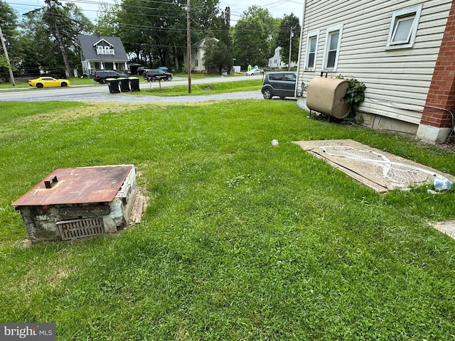 386 Round Hill Rd, Winchester, VA 22602 - view of green lawn with oil tank