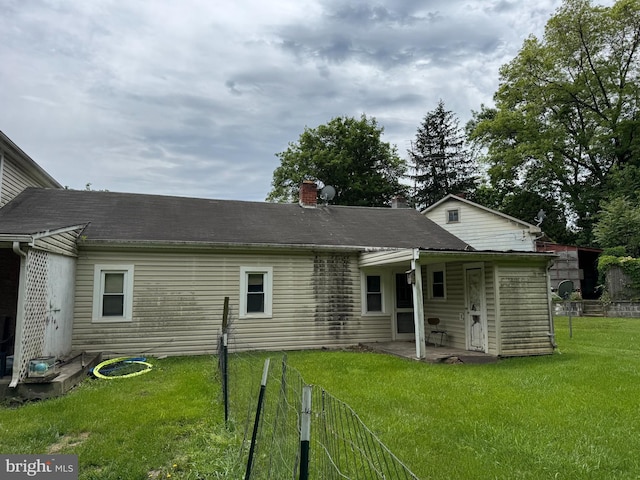 386 Round Hill Rd, Winchester, VA 22602 - rear view of property featuring a patio area and a chimney