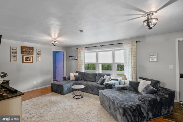 1980 State Route 72 N, Lebanon, PA 17046 - living room featuring a chandelier, wood finished floors, and baseboards