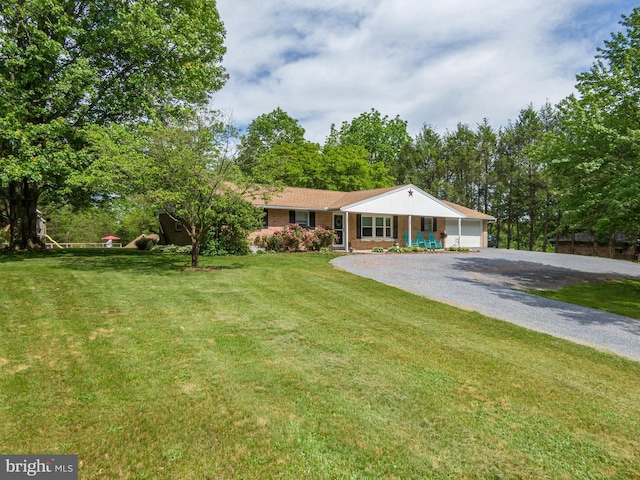 1980 State Route 72 N, Lebanon, PA 17046 - single story home with brick siding, driveway, a front yard, and a garage
