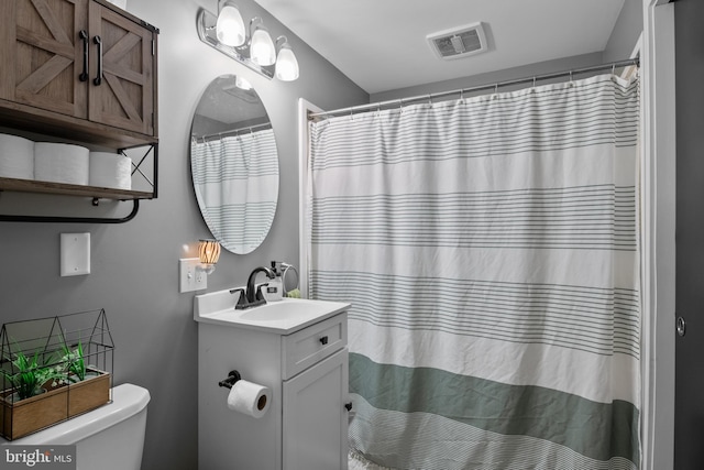 1980 State Route 72 N, Lebanon, PA 17046 - bathroom with toilet, vanity, and a shower with shower curtain