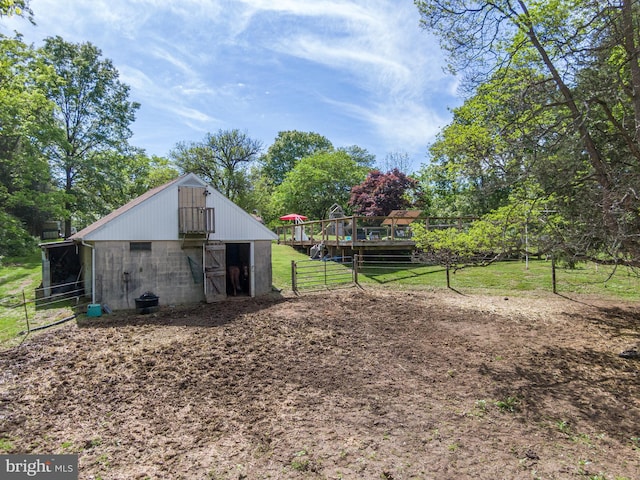 1980 State Route 72 N, Lebanon, PA 17046 - view of side of property with concrete block siding, an outbuilding, view of wooded area, and a barn