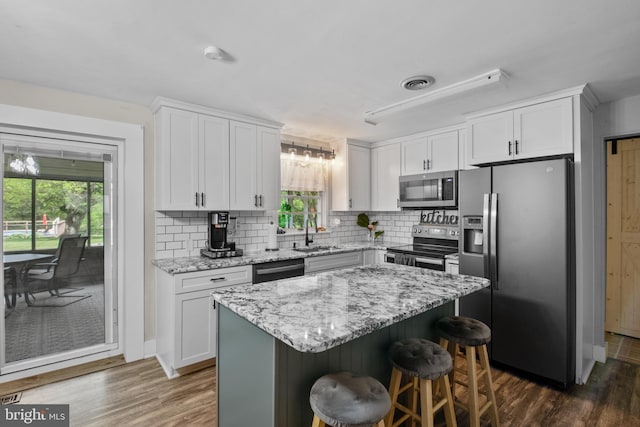 1980 State Route 72 N, Lebanon, PA 17046 - kitchen featuring stainless steel appliances, a sink, white cabinetry, and dark wood-style flooring