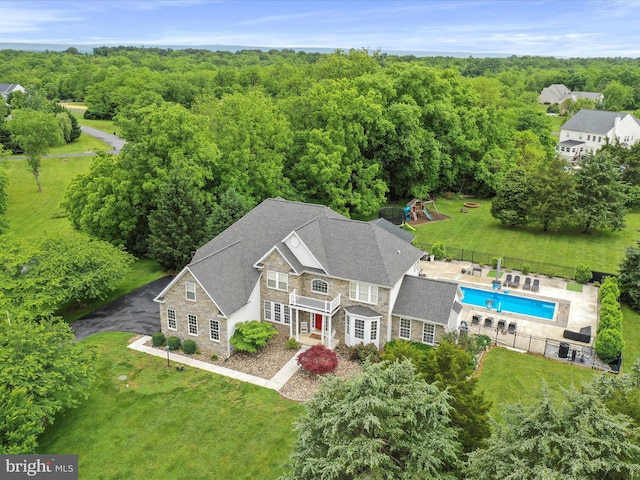40 Inaugural Way, Charles Town, WV 25414 - view of subject property featuring a heavily wooded area and a pool