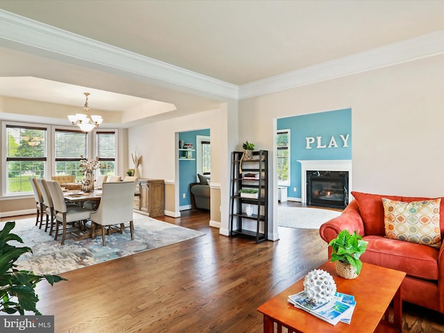 40 Inaugural Way, Charles Town, WV 25414 - dining space with a chandelier, dark wood-style floors, a premium fireplace, ornamental molding, and baseboards