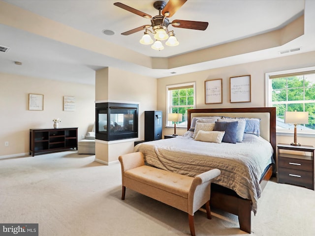 40 Inaugural Way, Charles Town, WV 25414 - bedroom featuring carpet floors, a ceiling fan, baseboards, and a raised ceiling