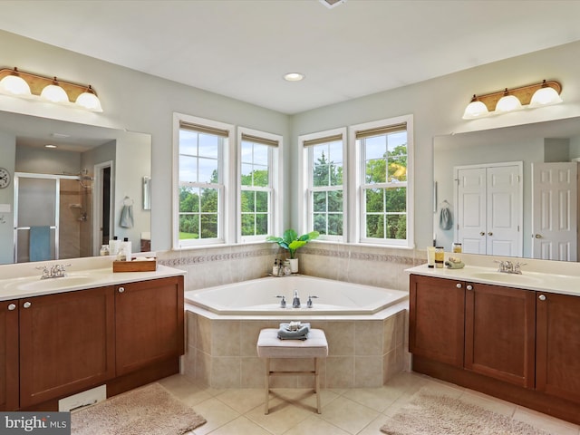 40 Inaugural Way, Charles Town, WV 25414 - full bath with healthy amount of natural light, two vanities, and tile patterned flooring
