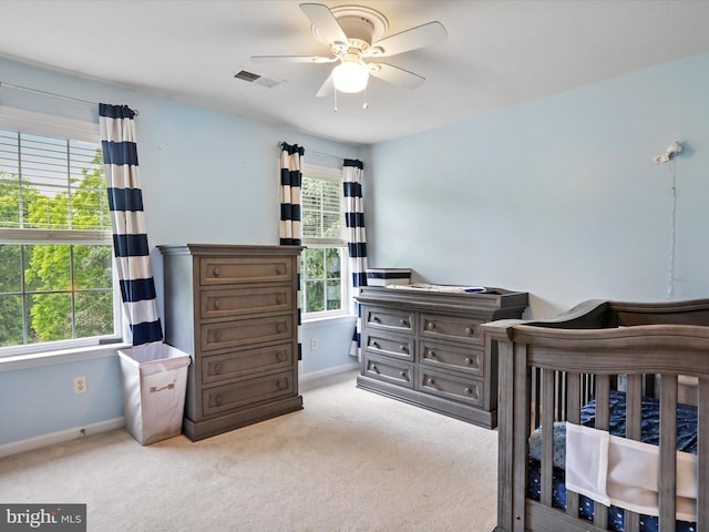 40 Inaugural Way, Charles Town, WV 25414 - bedroom with baseboards, light carpet, and ceiling fan