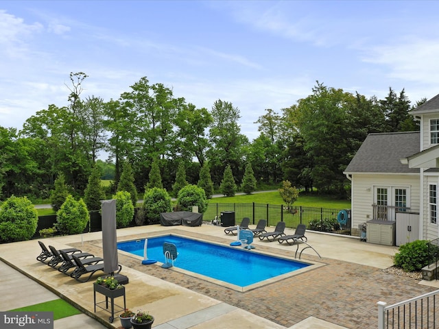 40 Inaugural Way, Charles Town, WV 25414 - view of pool featuring a patio, an outdoor structure, and french doors