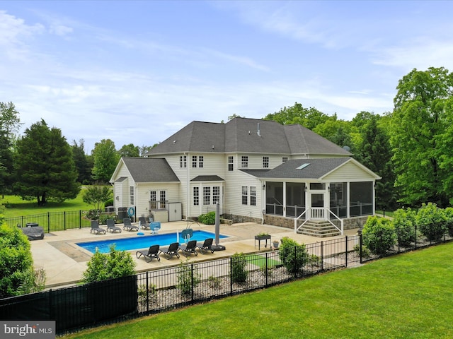 40 Inaugural Way, Charles Town, WV 25414 - rear view of house featuring a sunroom, a patio, and roof with shingles