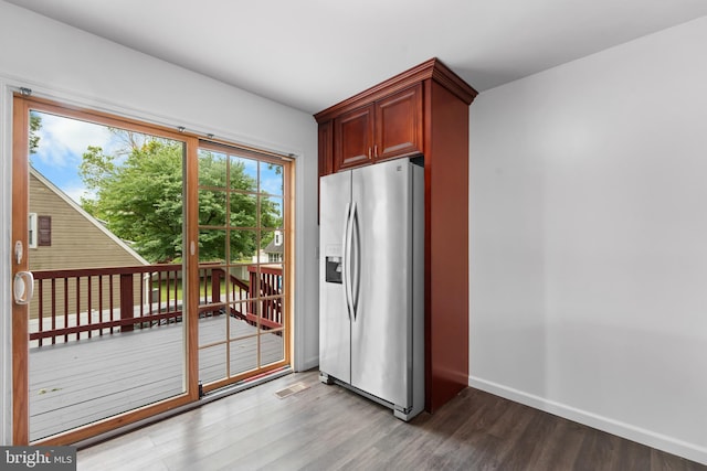 304 Montfield Ln, Glen Burnie, MD 21061 - kitchen featuring stainless steel refrigerator with ice dispenser, wood finished floors, baseboards, and reddish brown cabinets