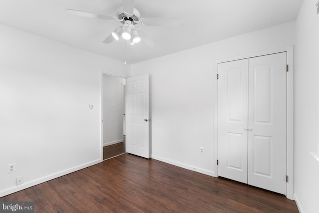304 Montfield Ln, Glen Burnie, MD 21061 - unfurnished bedroom with dark wood-style floors and baseboards
