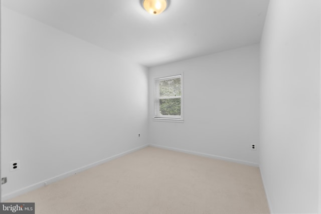 304 Montfield Ln, Glen Burnie, MD 21061 - spare room featuring light carpet and baseboards