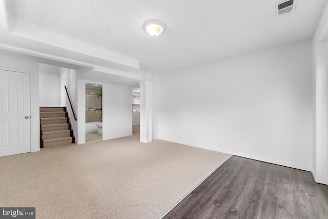 304 Montfield Ln, Glen Burnie, MD 21061 - finished below grade area with stairs, baseboards, and wood finished floors
