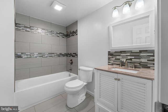 304 Montfield Ln, Glen Burnie, MD 21061 - bathroom with toilet, vanity, tile patterned floors, decorative backsplash, and shower / bath combination