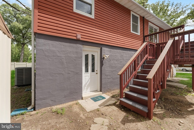 304 Montfield Ln, Glen Burnie, MD 21061 - property entrance with central air condition unit and a deck