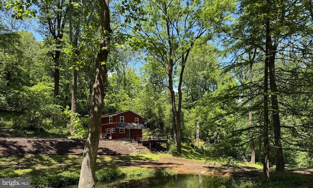 18 Bolton Branch Ln, Huntly, VA 22640 - view of yard with a deck, a view of trees, and stairs