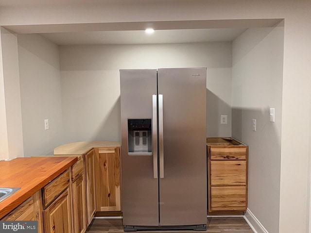 18 Bolton Branch Ln, Huntly, VA 22640 - kitchen with stainless steel fridge, dark wood-style flooring, wood counters, brown cabinetry, and recessed lighting
