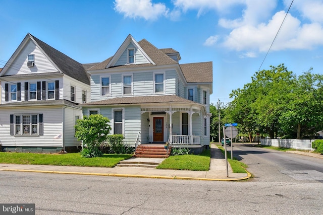 706 Locust St, Cambridge, MD 21613 - view of front of home featuring a porch and roof with shingles