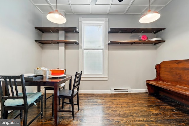 706 Locust St, Cambridge, MD 21613 - dining space featuring wood finished floors, a baseboard heating unit, and baseboards