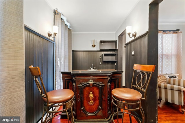 706 Locust St, Cambridge, MD 21613 - bar area with wood finished floors and ornamental molding