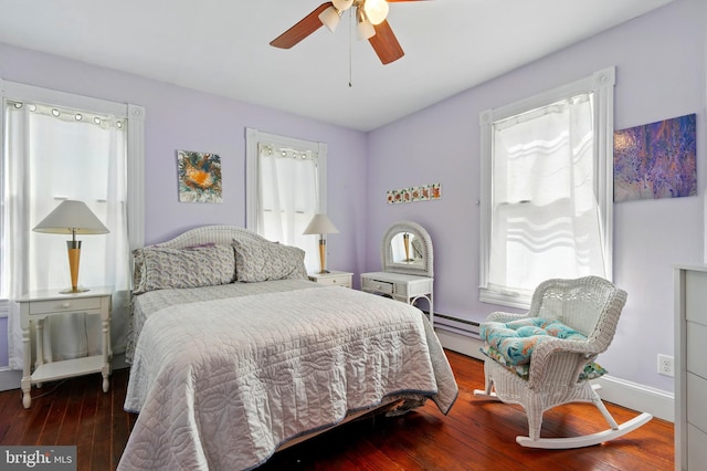 706 Locust St, Cambridge, MD 21613 - bedroom with wood-type flooring, baseboards, and ceiling fan