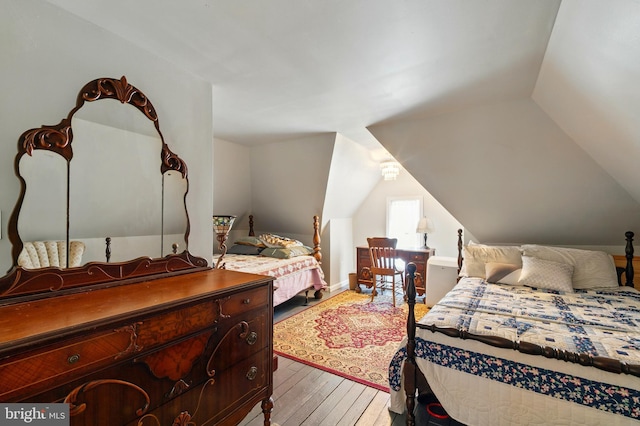 706 Locust St, Cambridge, MD 21613 - bedroom featuring vaulted ceiling and light wood finished floors