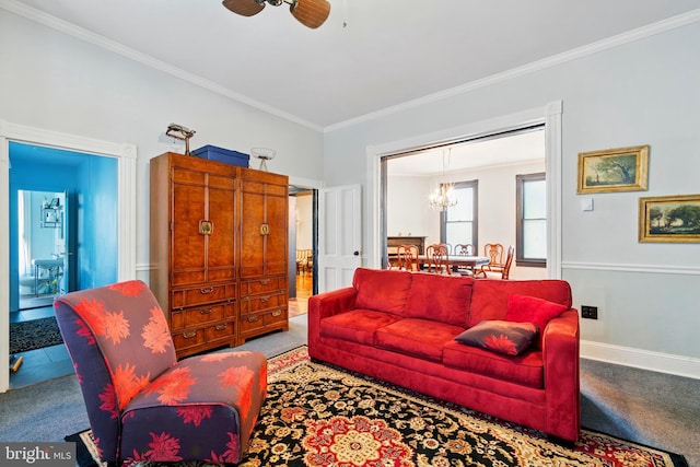 706 Locust St, Cambridge, MD 21613 - carpeted living room with ornamental molding, a chandelier, ceiling fan, and baseboards