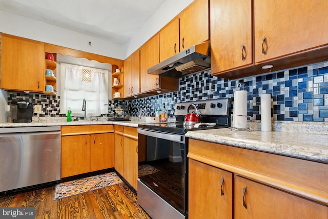 706 Locust St, Cambridge, MD 21613 - kitchen featuring appliances with stainless steel finishes, under cabinet range hood, open shelves, and backsplash