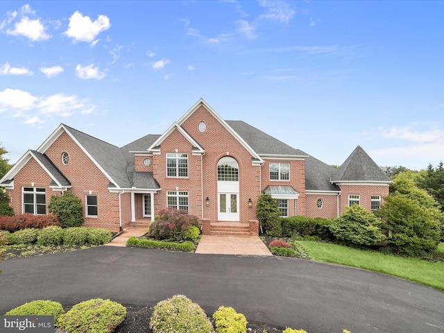 6419 Homebuilder Dr, Mount Airy, MD 21771 - view of front facade featuring brick siding and french doors