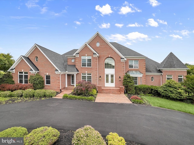 6419 Homebuilder Dr, Mount Airy, MD 21771 - view of front facade featuring brick siding and french doors