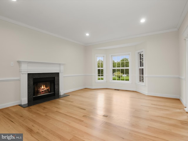 6419 Homebuilder Dr, Mount Airy, MD 21771 - unfurnished living room featuring light wood-type flooring, a premium fireplace, ornamental molding, baseboards, and recessed lighting