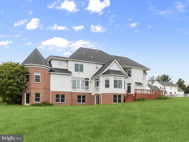6419 Homebuilder Dr, Mount Airy, MD 21771 - rear view of property featuring brick siding, a yard, and a shingled roof
