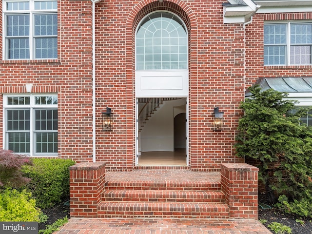 6419 Homebuilder Dr, Mount Airy, MD 21771 - view of exterior entry featuring brick siding