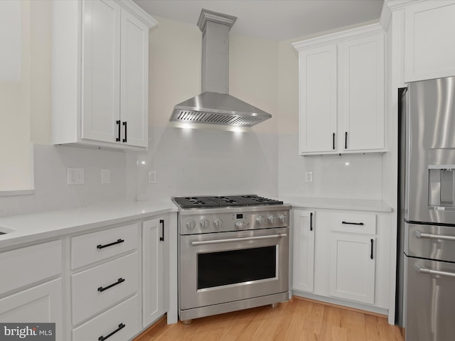 6419 Homebuilder Dr, Mount Airy, MD 21771 - kitchen with stainless steel appliances, exhaust hood, light countertops, and white cabinetry