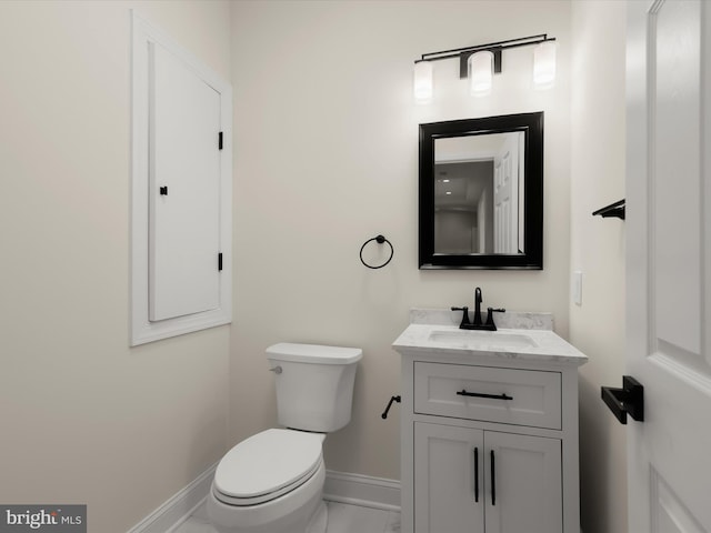 6419 Homebuilder Dr, Mount Airy, MD 21771 - bathroom featuring baseboards, vanity, toilet, and marble finish floors