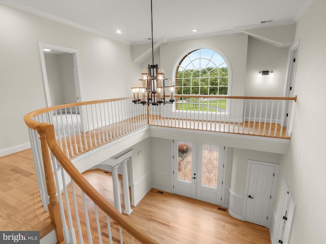 6419 Homebuilder Dr, Mount Airy, MD 21771 - stairs featuring a chandelier, wood finished floors, ornamental molding, recessed lighting, and baseboards