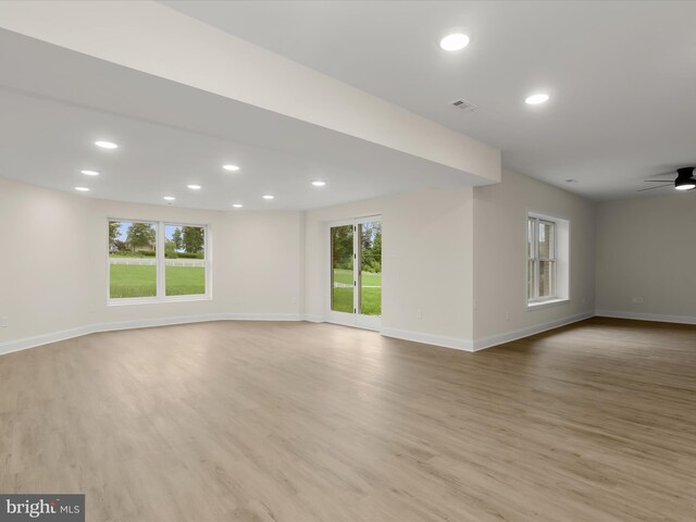 6419 Homebuilder Dr, Mount Airy, MD 21771 - unfurnished living room with baseboards, wood finished floors, recessed lighting, and a ceiling fan