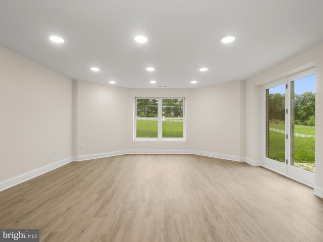 6419 Homebuilder Dr, Mount Airy, MD 21771 - empty room featuring light wood finished floors, plenty of natural light, recessed lighting, and baseboards