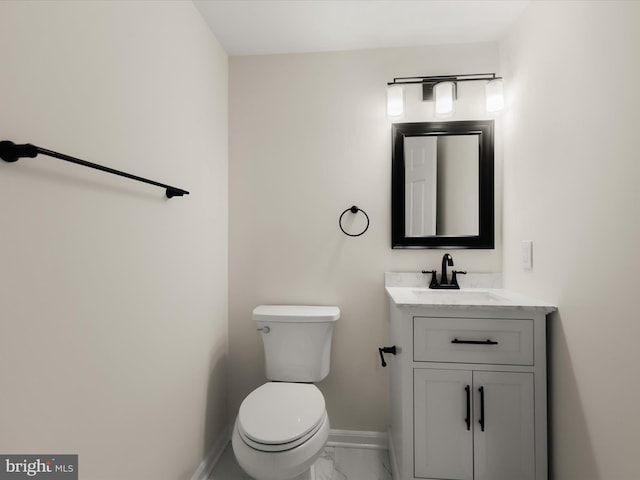 6419 Homebuilder Dr, Mount Airy, MD 21771 - half bath with marble look tiles, baseboards, vanity, and toilet